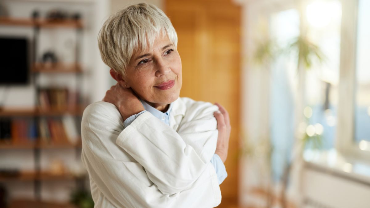 a woman embracing herself